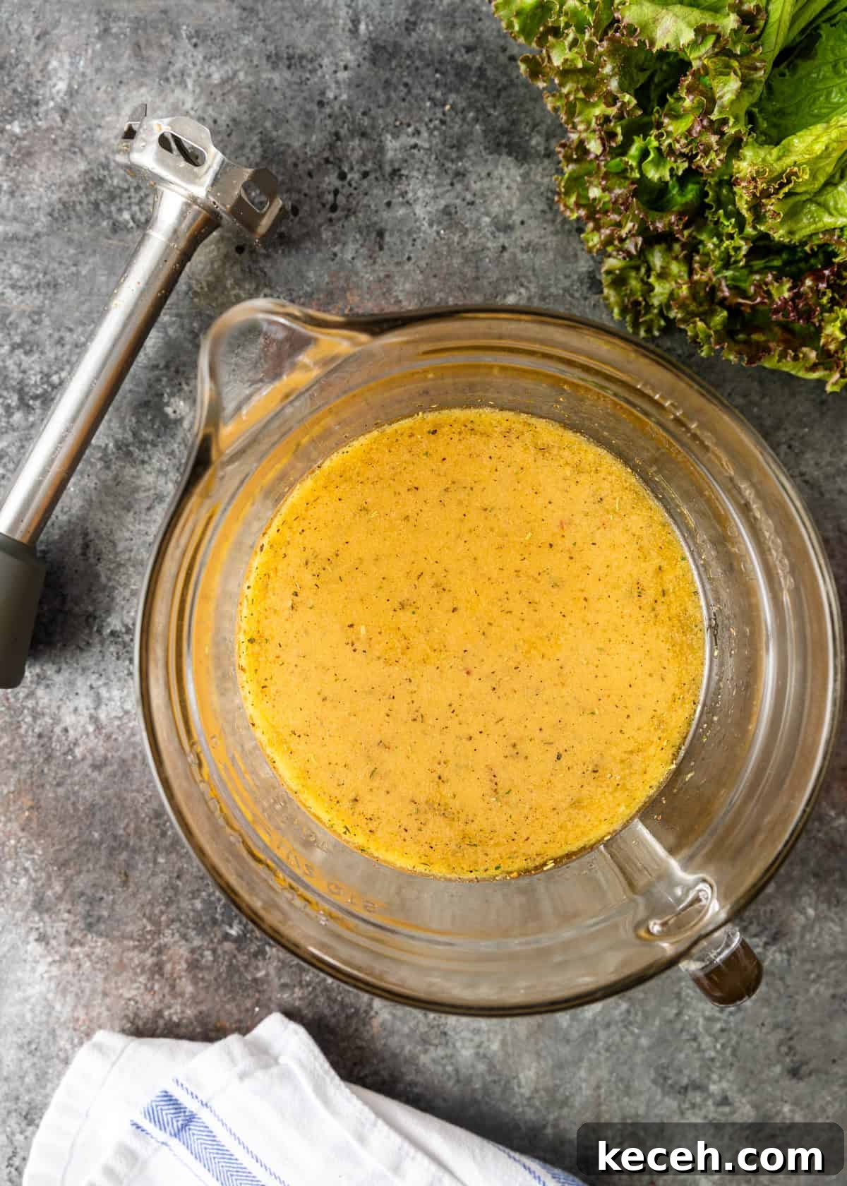 Two Homemade Italian Salad Dressings: Classic & Zesty Variations 7 overhead process shot: Italian salad dressing recipe in a glass measuring cup after blending