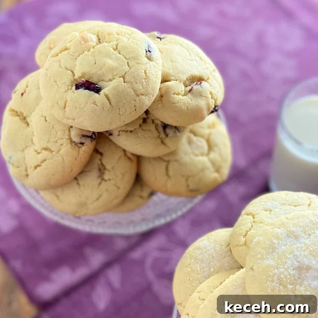 Perfect Cookie Dough Recipe for Baking and Safe Snacking 10 Cookies stacked on glass pedastal.