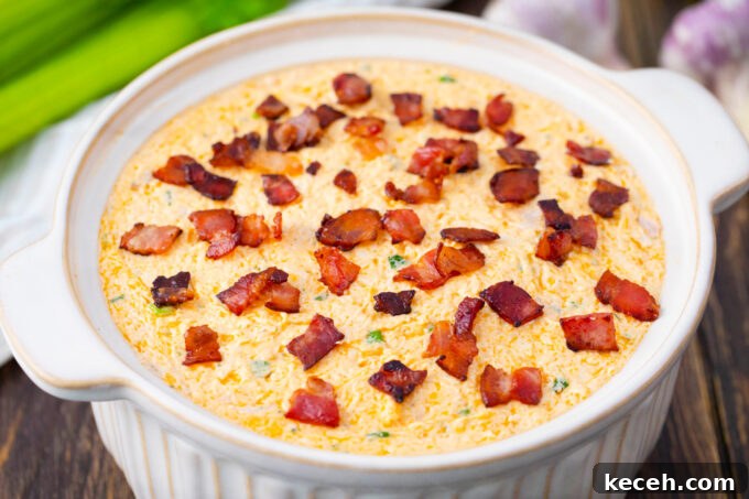 One-Bowl Buffalo Chicken Dip Recipe for Game Day 6 Buffalo crack chicken dip before baking it.
