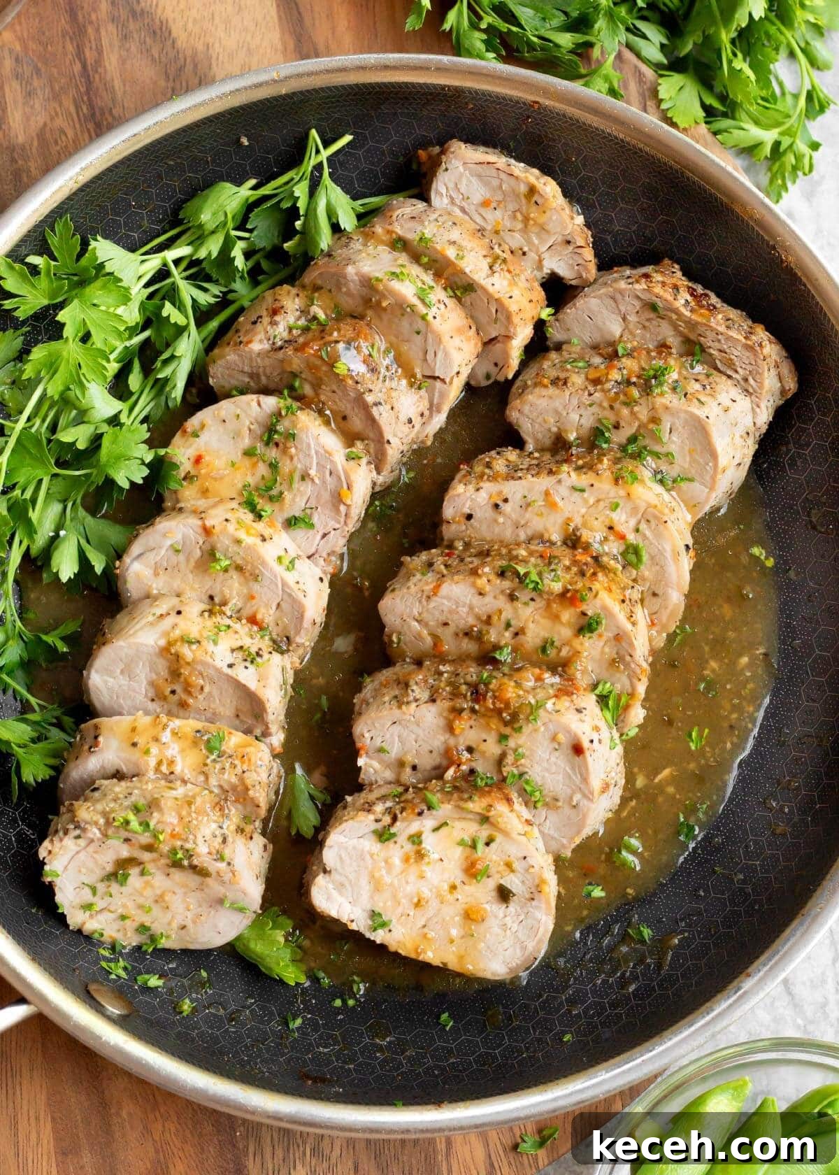 Oven-Roasted Pork Tenderloin Recipe 10 2 Easy Baked Pork Tenderloin sliced in a skillet