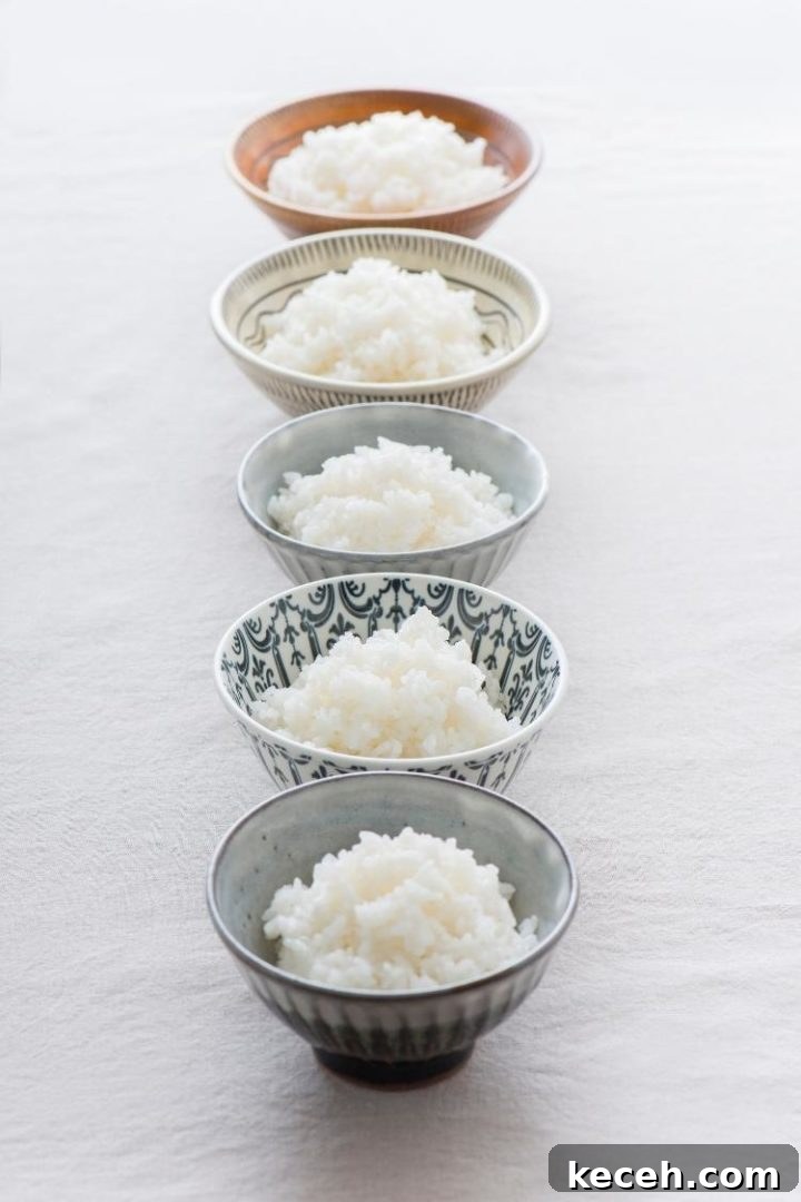 Instant Pot Rice: Perfect Fluffy Rice Every Time 4 bowls of cooked white rice