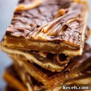 Saltine Cracker Toffee Recipe — Classic Christmas Crack Candy 11 Peanut-Butter-Swirl-Saltine-Crack pieces stacked on each other