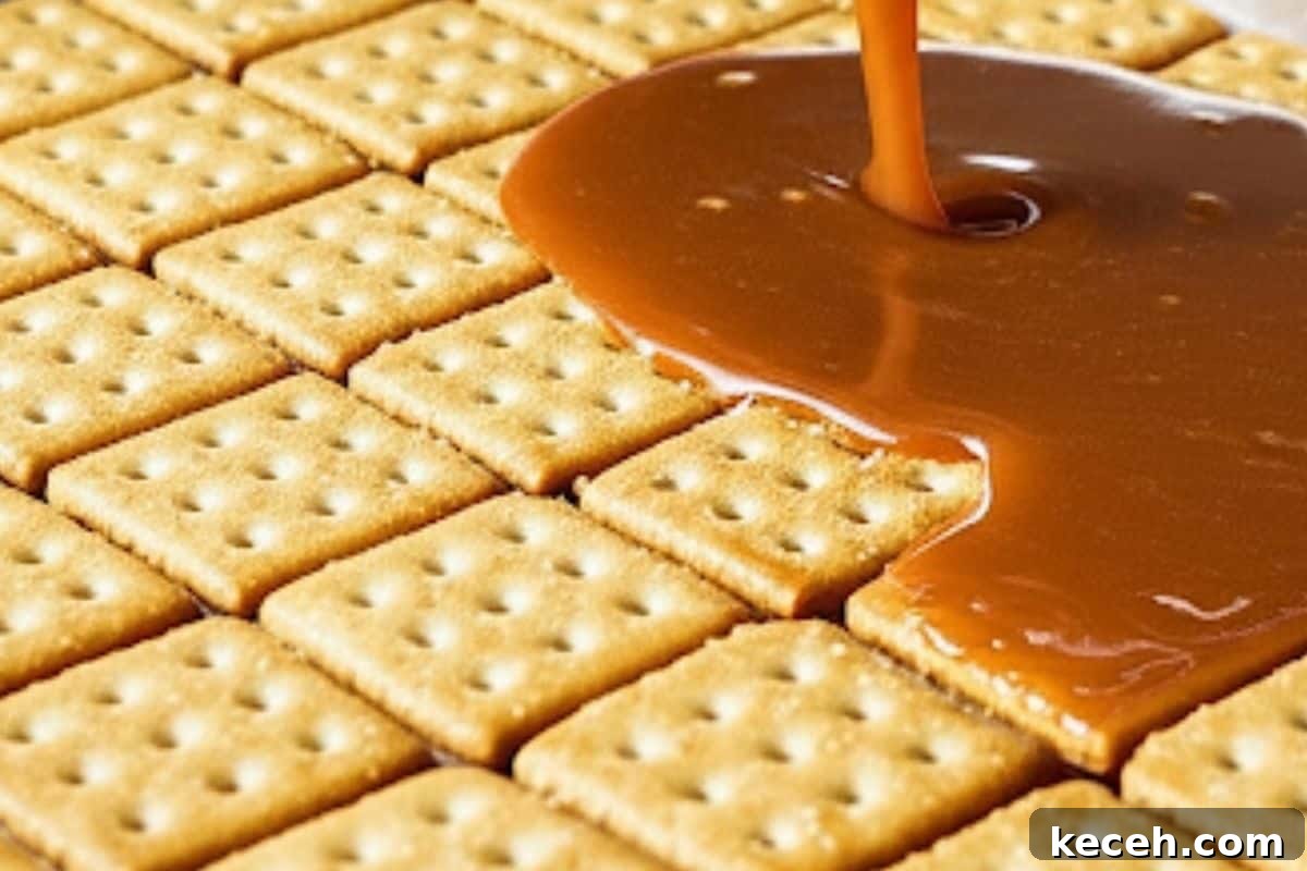 Saltine Cracker Toffee Recipe — Classic Christmas Crack Candy 7 Pour in the hot toffee mixture on top of the crackers.