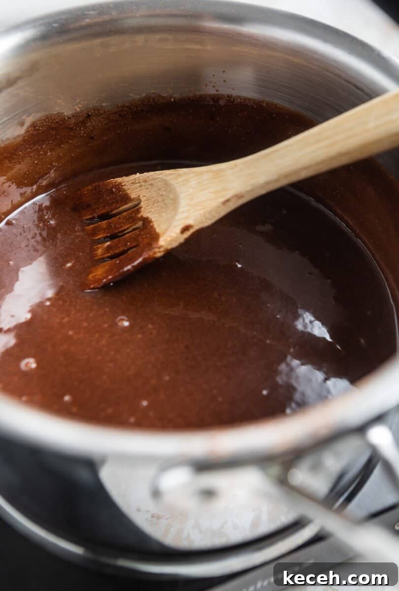 No-Bake Cookie Butter Treats: Quick No-Oven Dessert Recipe 5 Melted chocolate mixture in sauce pan.