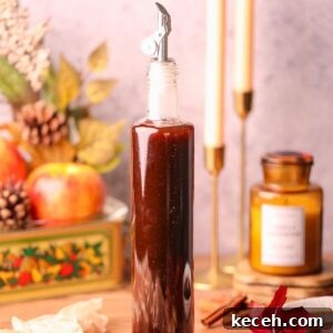 Apple and Brown Sugar Syrup Recipe for Pancakes & Coffee 13 apple brown sugar syrup in a glass bottle.
