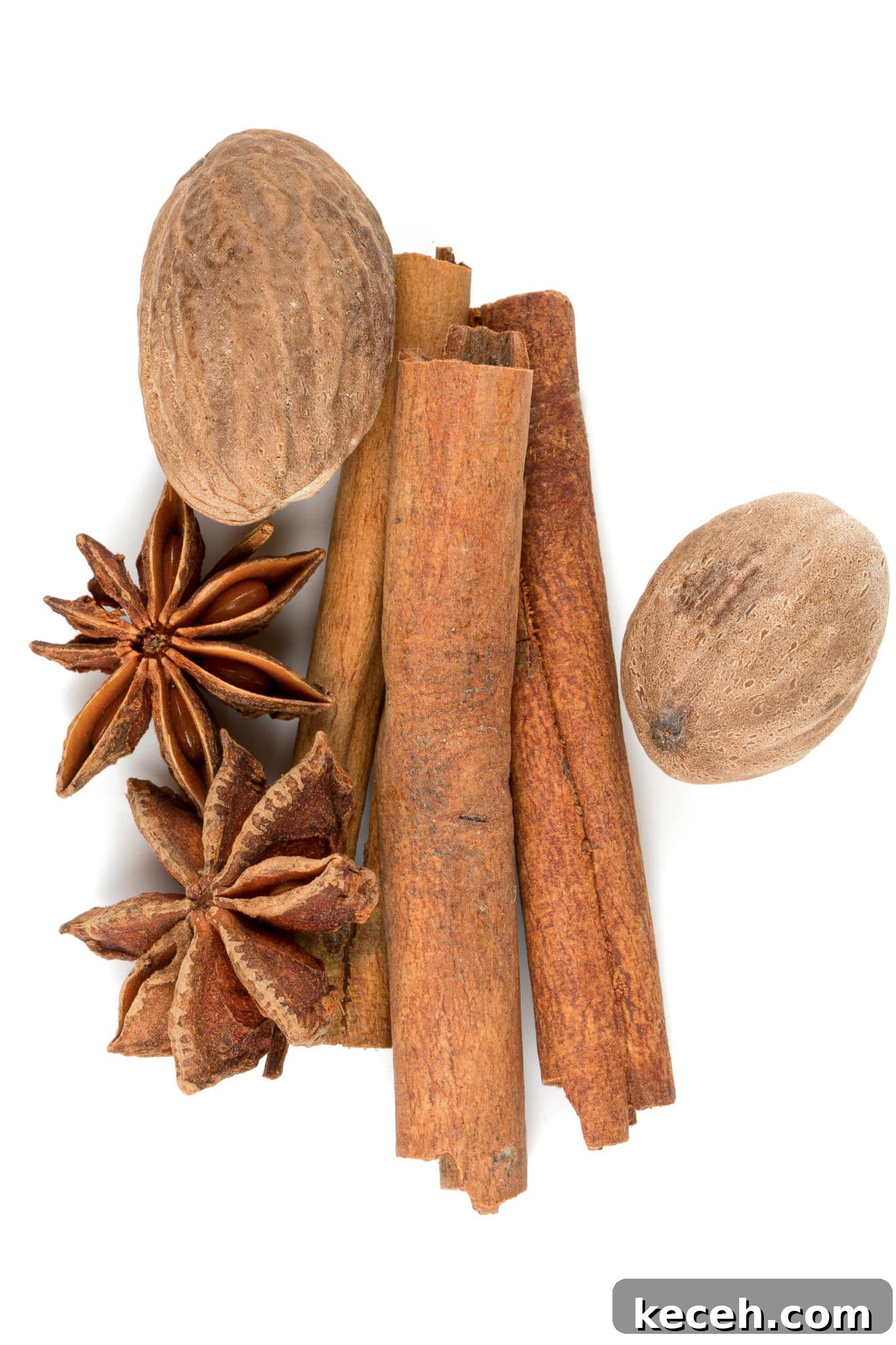 nutmeg, cinnamon and star anise isolated on white