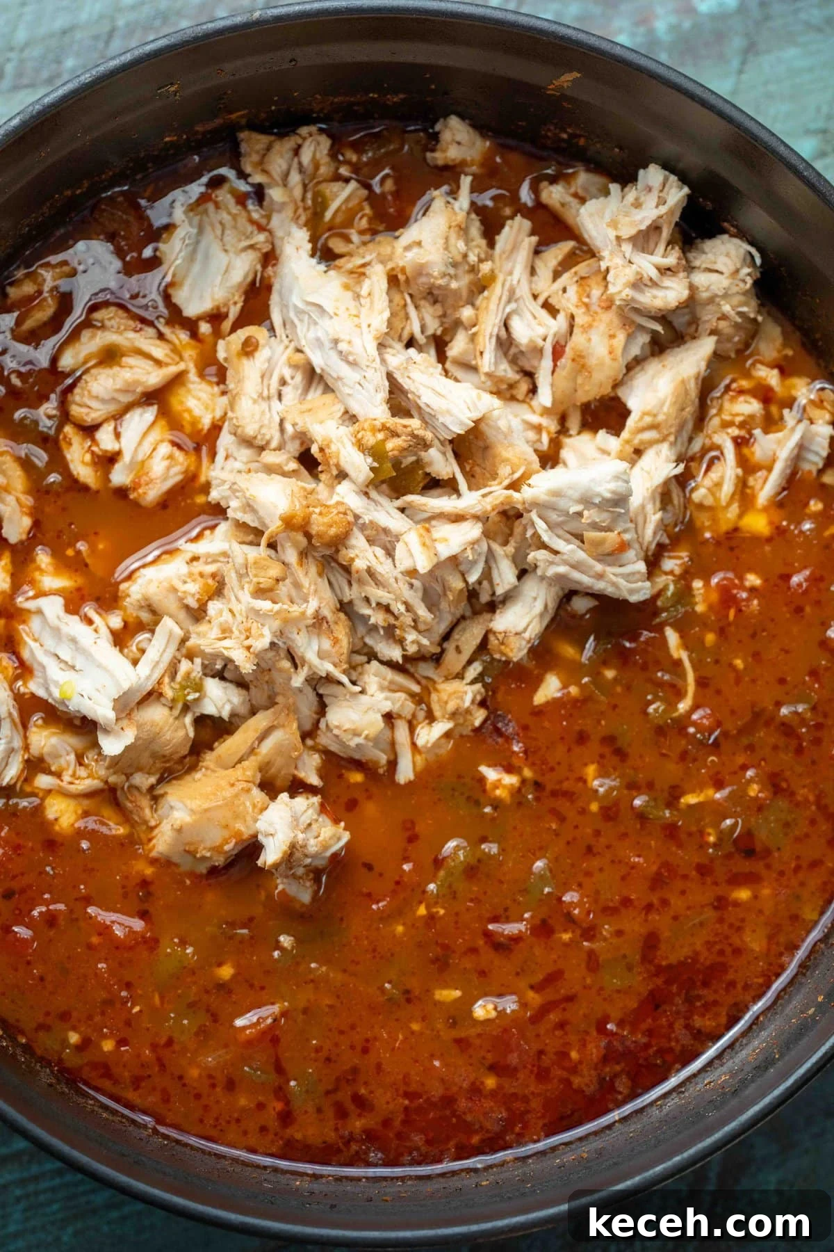 Fiery Chicken Soup Recipe for Bold, Comforting Flavor 8 shredded chicken in a spicy adobo soup