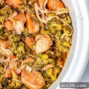 Slow Cooker Chicken and Broccoli Dinner 7 The finished slow cooker chicken and broccoli in a white crockpot.