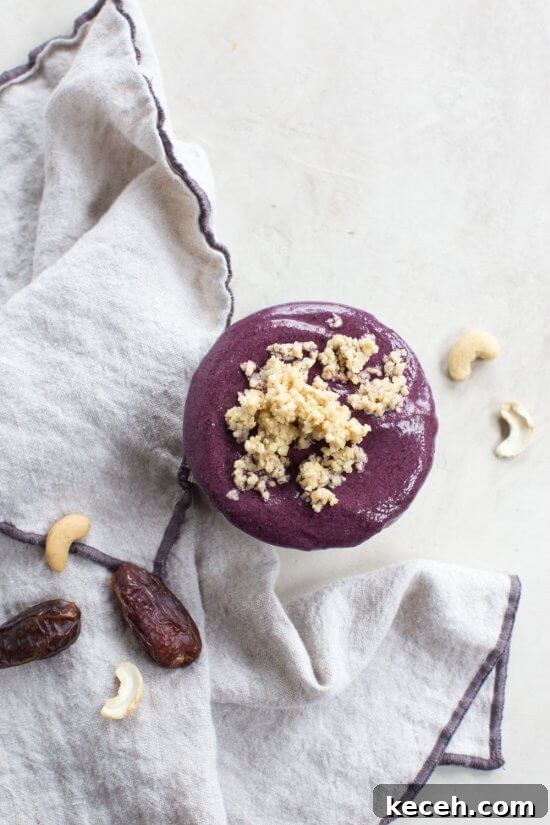 Vegan Blueberry Cheesecake Smoothie Bowl Recipe 4 vegan blueberry smoothie with wild blueberries, raw cashes, almond milk, and dates