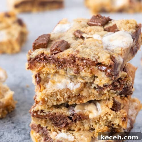 s'more cookie bars stacked featured image
