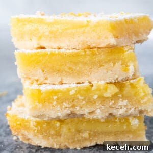 Classic Old-Fashioned Lemon Squares Recipe for Bright Dessert 15 lemon bars stacked featured image