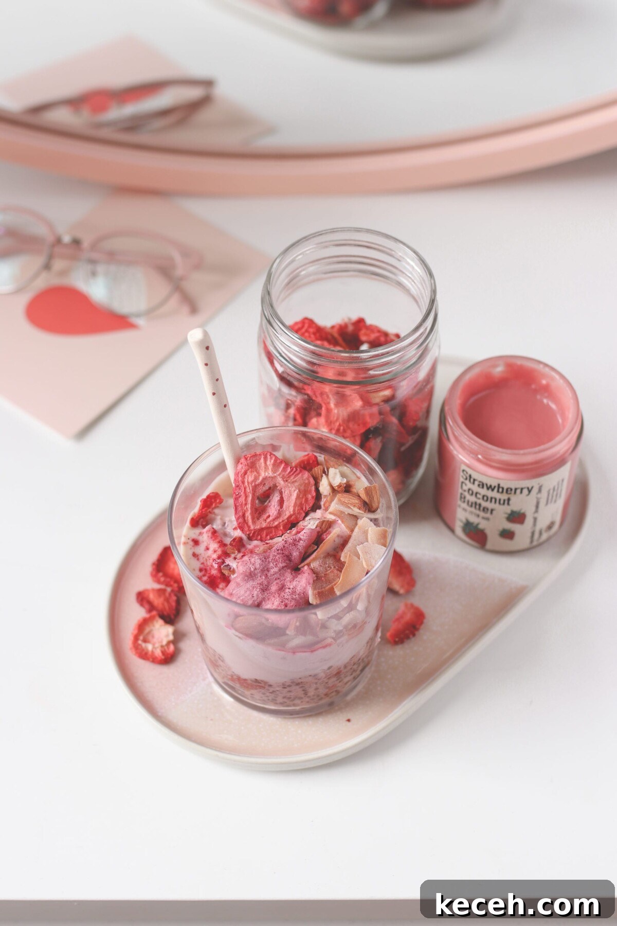 Strawberry Shortcake Overnight Oats Recipe – Make Ahead Breakfast 5 overhead shot of a tray of freeze dried strawberries and strawberry coconut butter