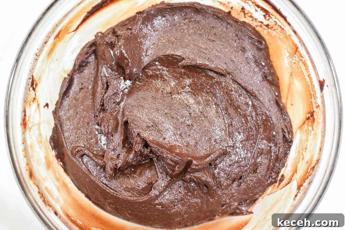 Decadent Baileys Chocolate Fudge Recipe 5 Baileys fudge ingredients in bowl.