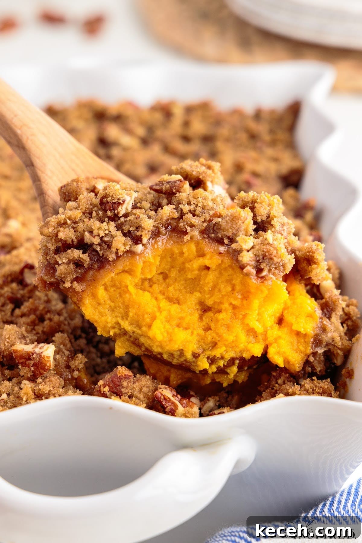 Irresistible Sweet Potato Soufflé Recipe for Holiday Desserts 12 Front view of a spoonful of Sweet Potato Souffle.