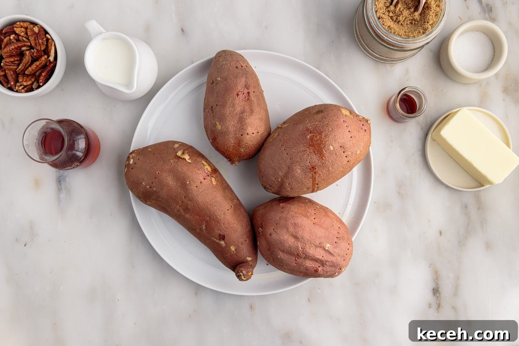 Irresistible Sweet Potato Soufflé Recipe for Holiday Desserts 4 Sweet potatoes on a plate.