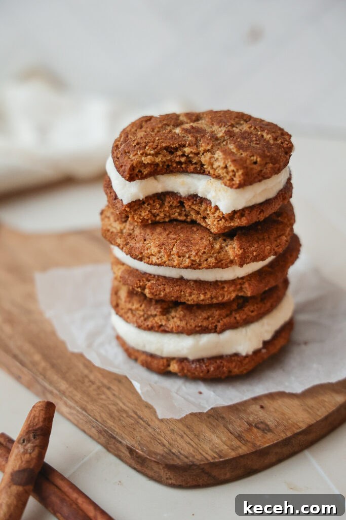 Gluten-Free Snickerdoodle Cream Pies — Paleo-Friendly Recipe 4 A bite taken out of a creme pie.