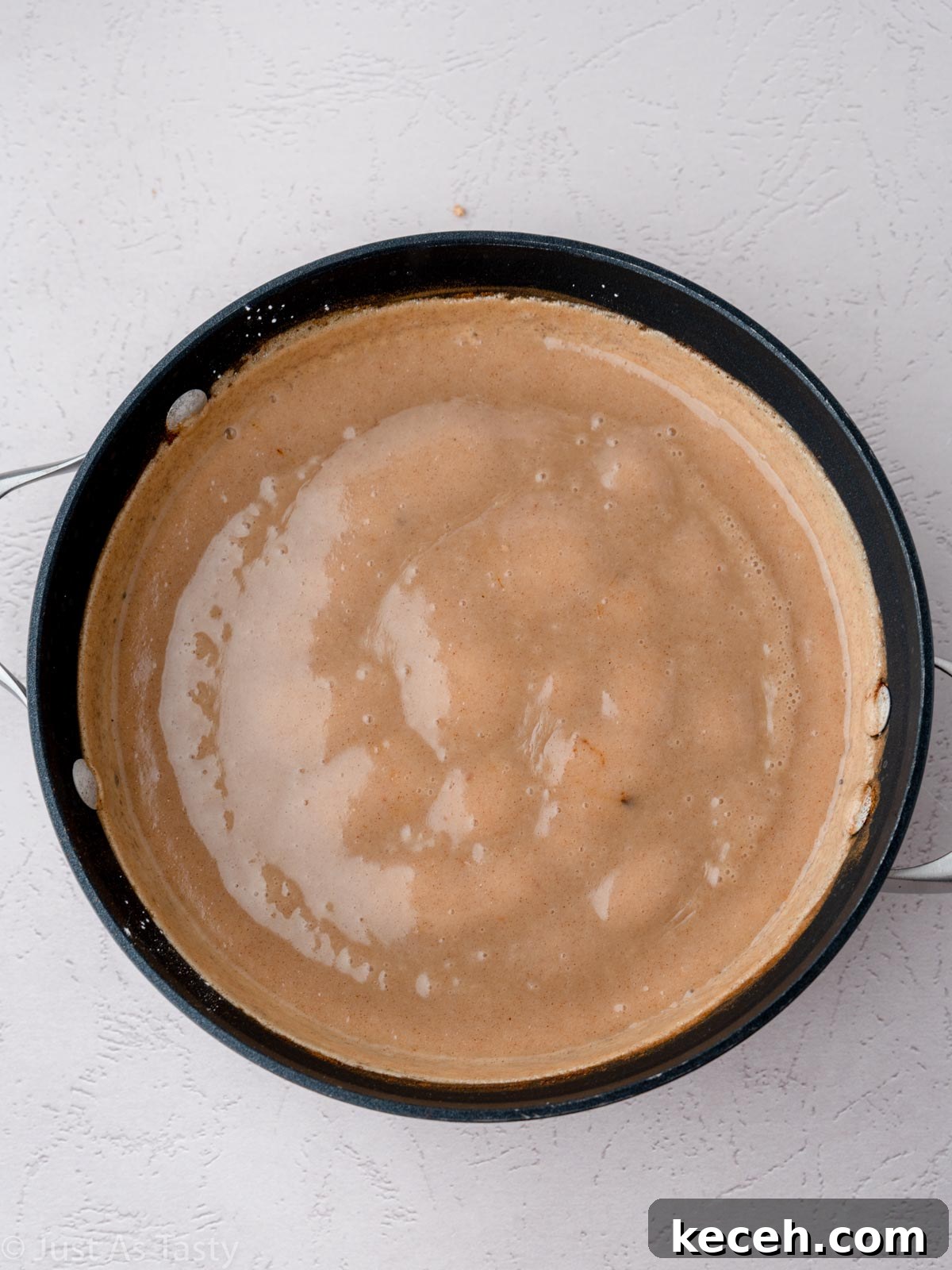 Butterscotch pie filling in a saucepan.