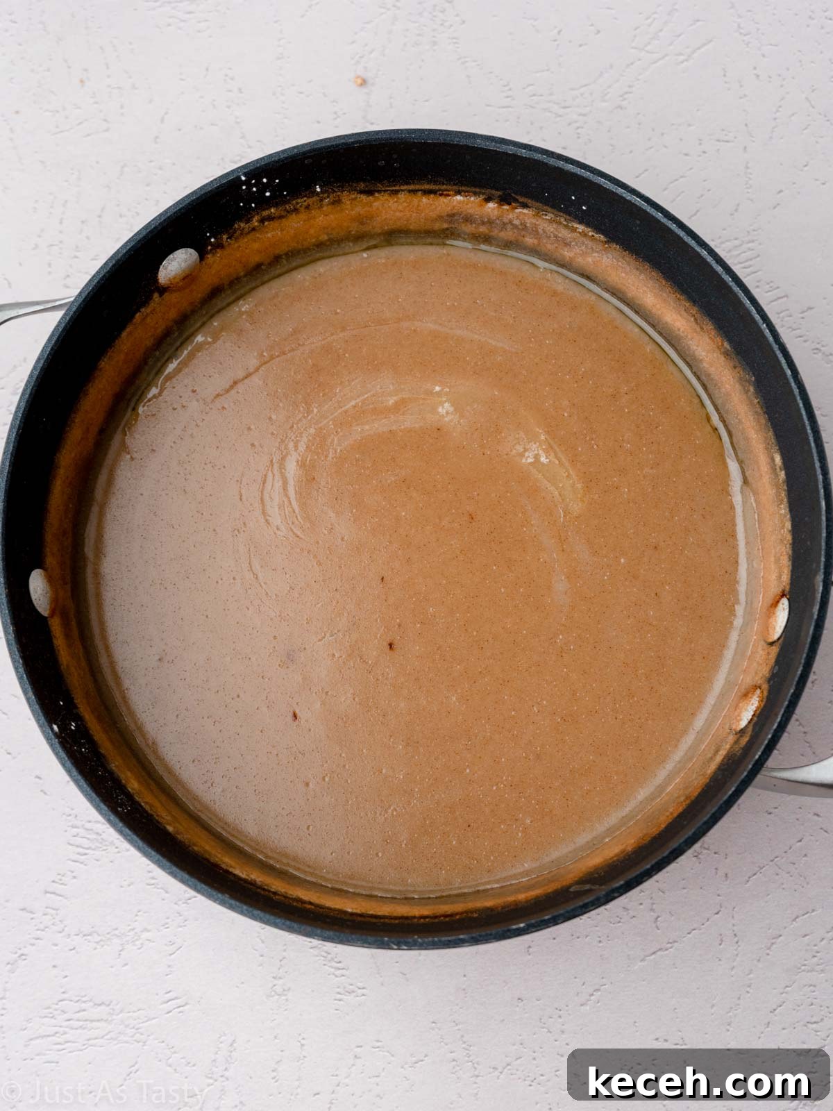 Butterscotch pie filling in a saucepan.