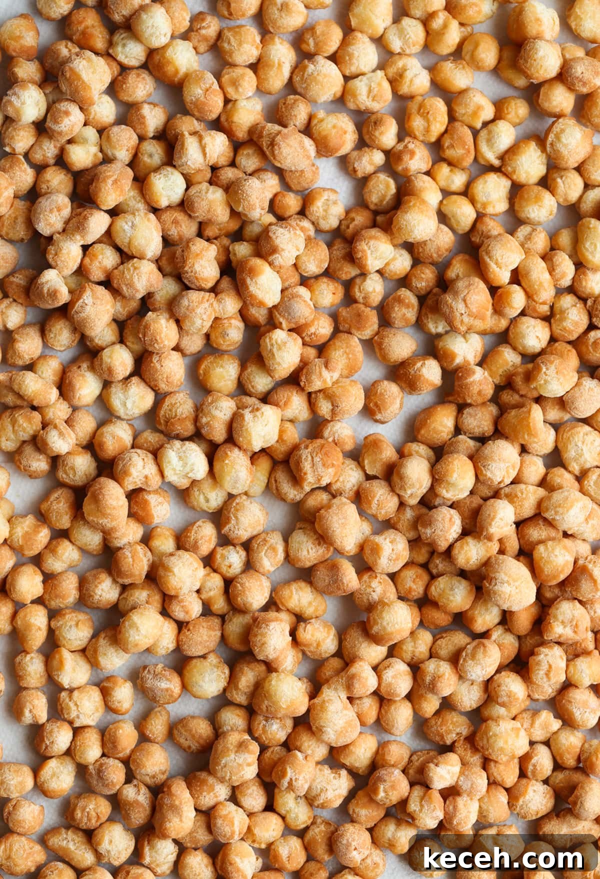 Authentic homemade Struffoli is such a fun Christmas dessert! Cute little balls of fried dough are coated in sweet honey and topped with your favorite holiday sprinkles. img 53599 4