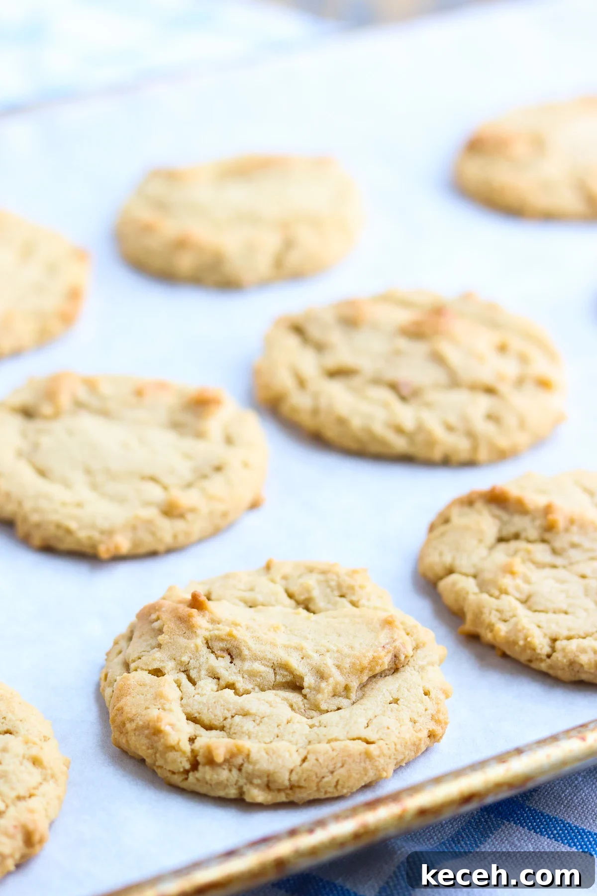 Crispy Peanut Butter Cookies Recipe: Crunchy, Golden Treats 3 sheet pan of hot baked crunchy peanut butter cookies