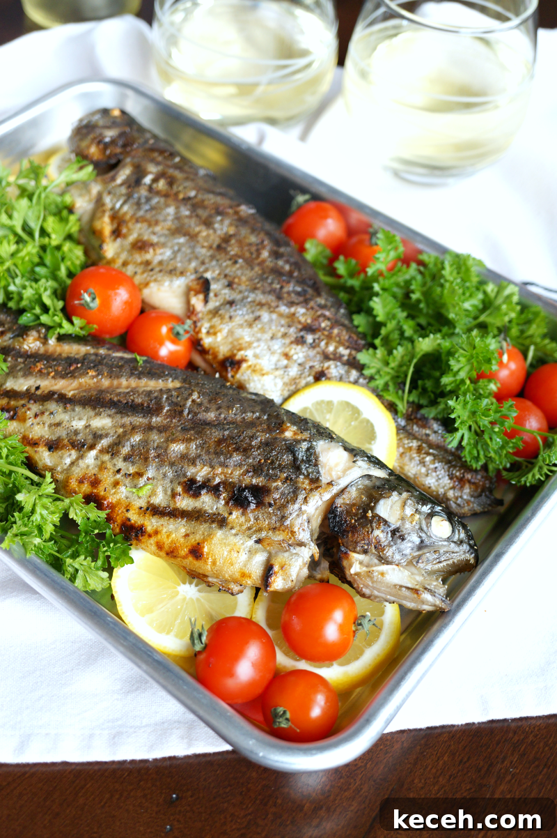 Whole Grilled Trout Recipe: Crispy Skin and Lemon Herb Flavor 3 grilled trout plated