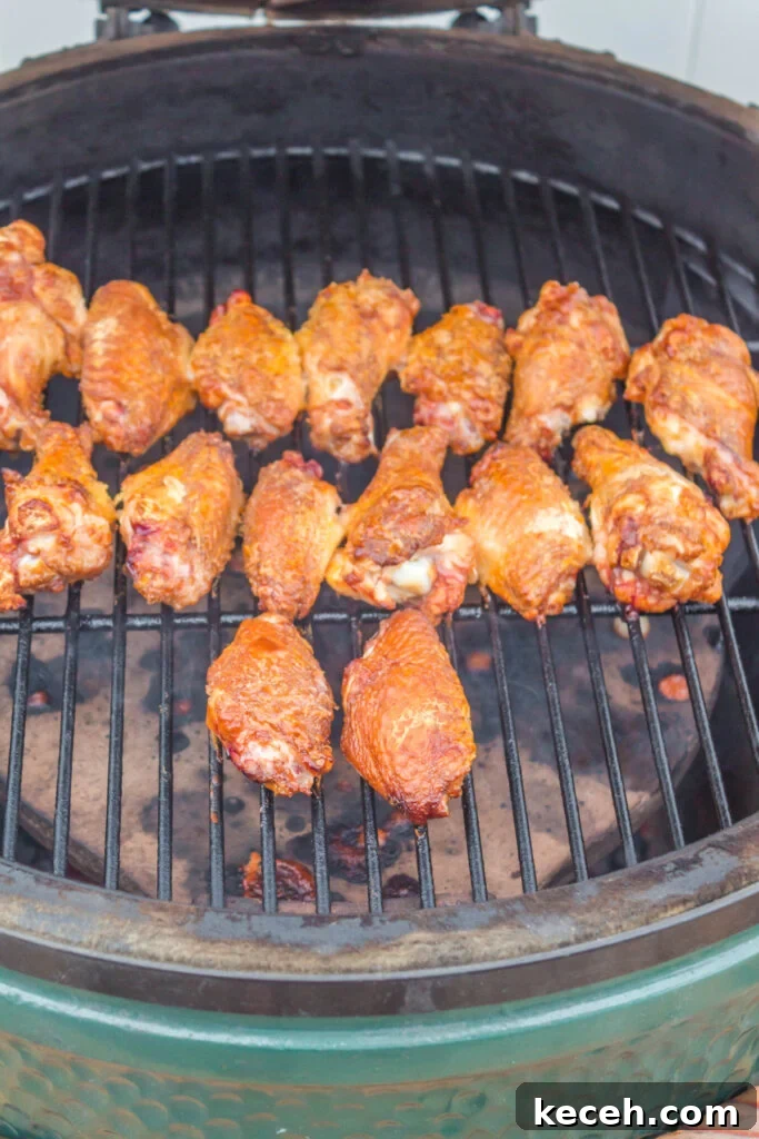 Crispy Grilled Chicken Wings Recipe for Perfectly Charred Skin 4 chicken wings on grill