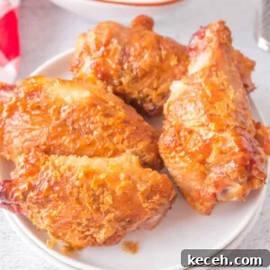 Crispy Grilled Chicken Wings Recipe for Perfectly Charred Skin 8 four grilled crispy chicken wings on plate