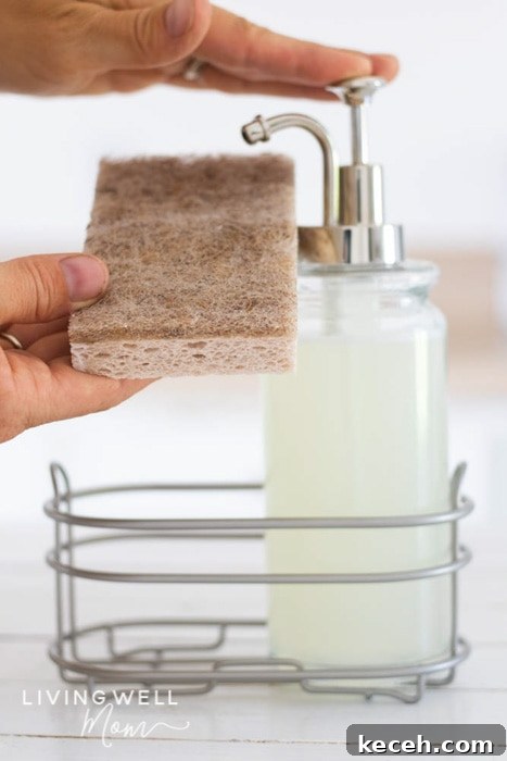 15 Smart Uses for Castile Soap: Home, Cleaning & Personal Care 6 squirting homemade liquid dish soap onto a sponge