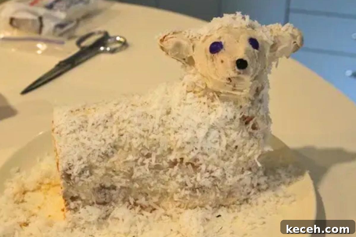 Lamb Cakes at Easter: Cherished Tradition or Baking Disaster? 17 A whimsical cake designed to resemble a lamb covered in coconut flakes, with decorative features like purple candy eyes.