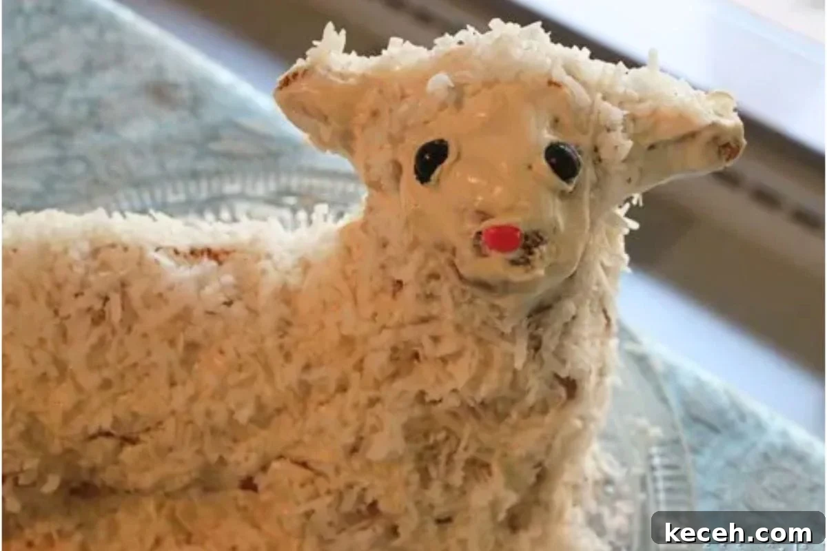 Lamb Cakes at Easter: Cherished Tradition or Baking Disaster? 4 A charming lamb-shaped dessert made with frosting and shredded coconut, featuring a red nose and expressive eyes.
