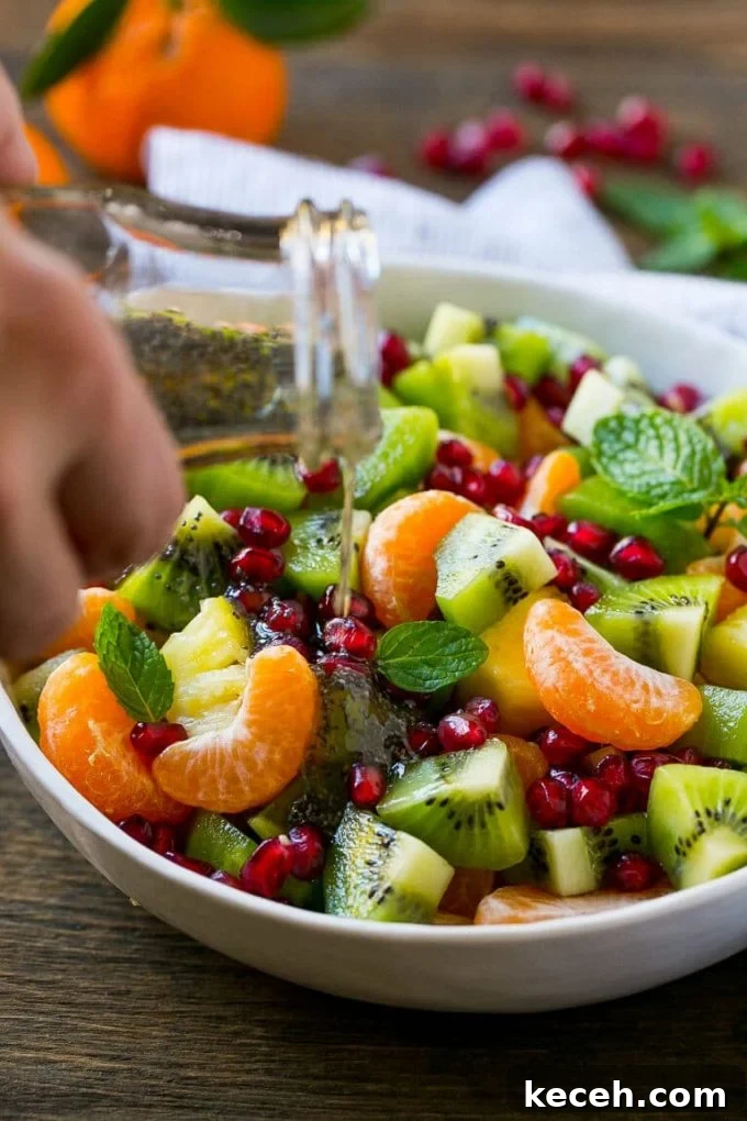 Winter fruit is topped with an easy sweet and tangy poppy seed dressing.
