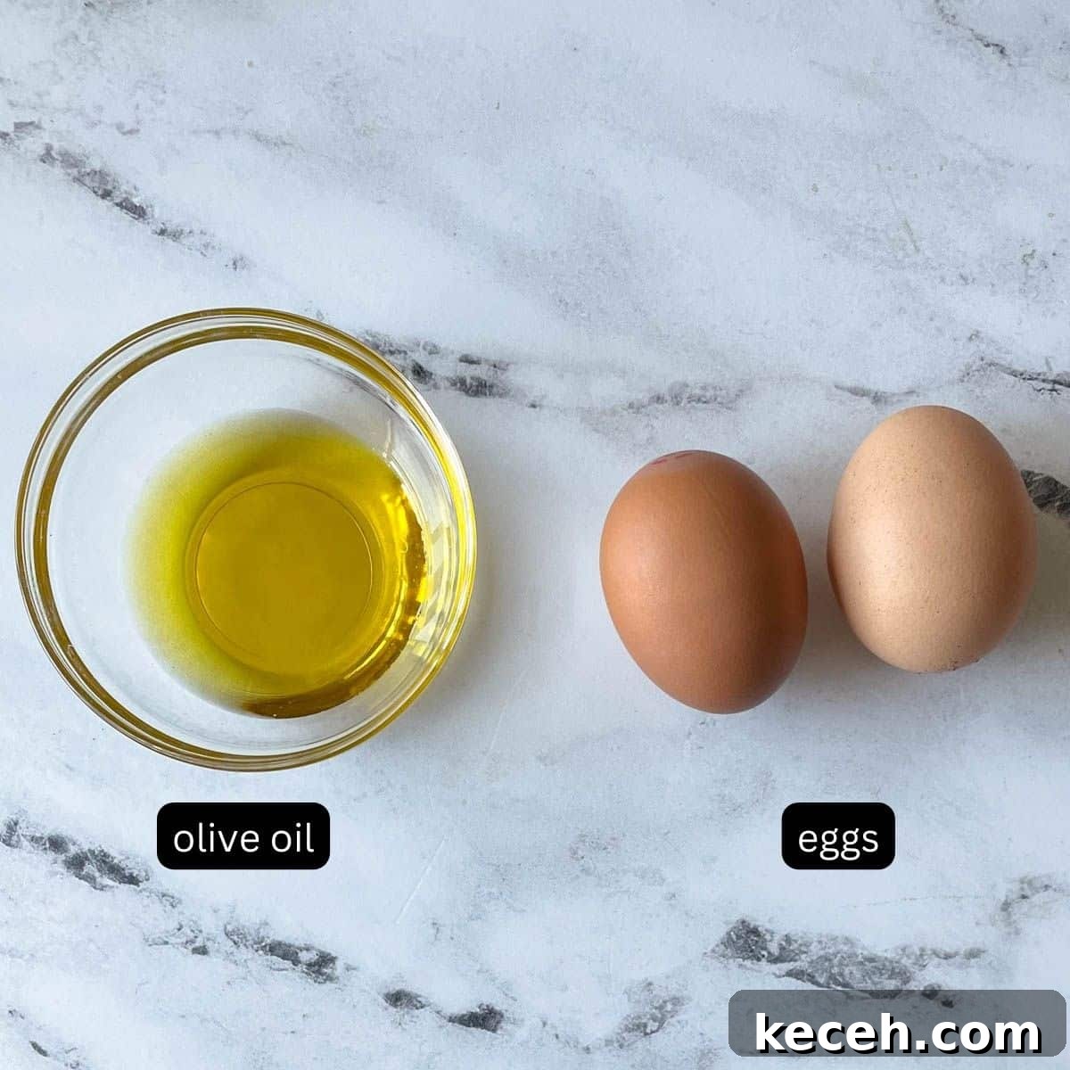 Authentic Greek Chickpea Soup (Revithosoupa) Recipe 4 Olive oil and two eggs sit on a white counter.
