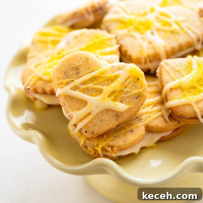 Lemon Poppy Seed Heart-Shaped Sandwich Cookies 16 a tray of lemon hearts.