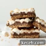 Stack of s'mores bars with graham cracker crust