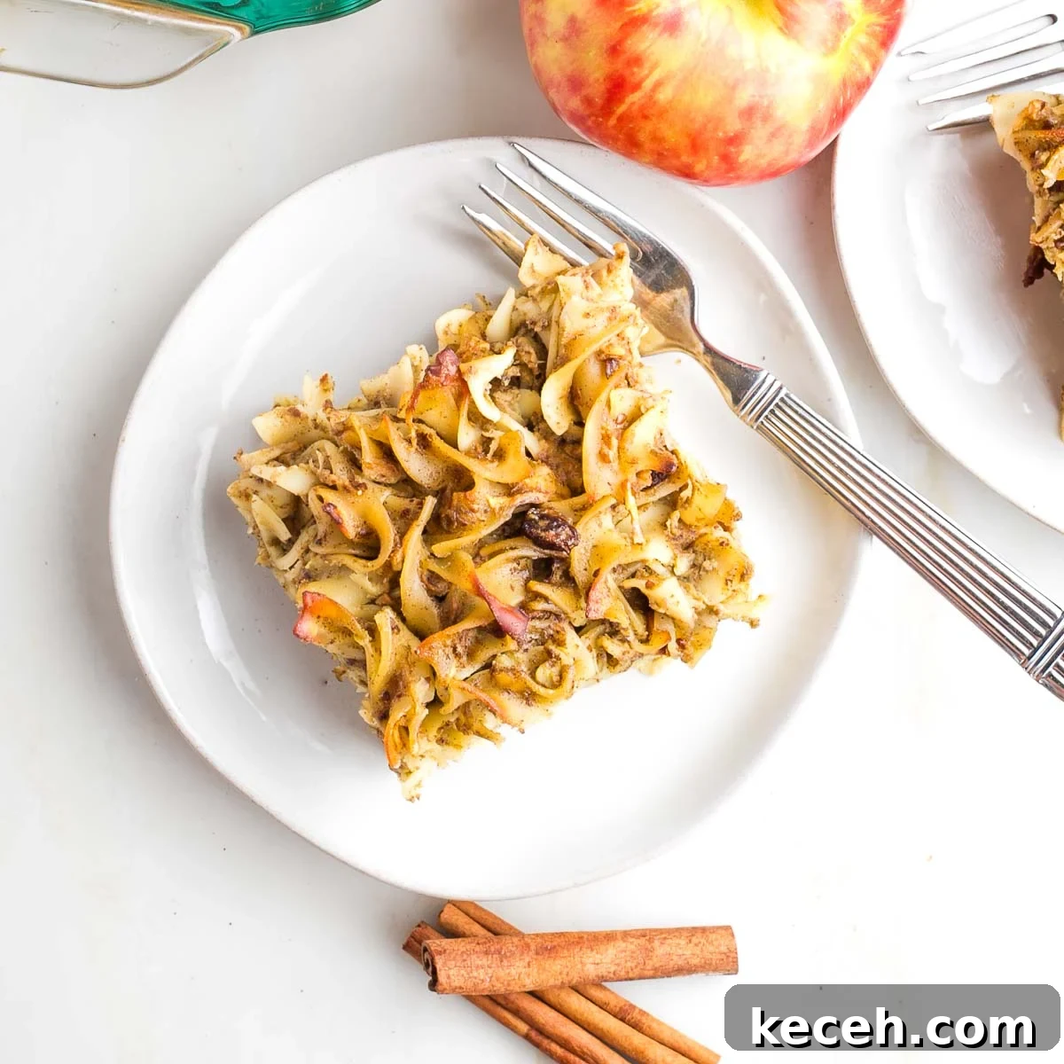 A piece of noodle kugel with raisins.