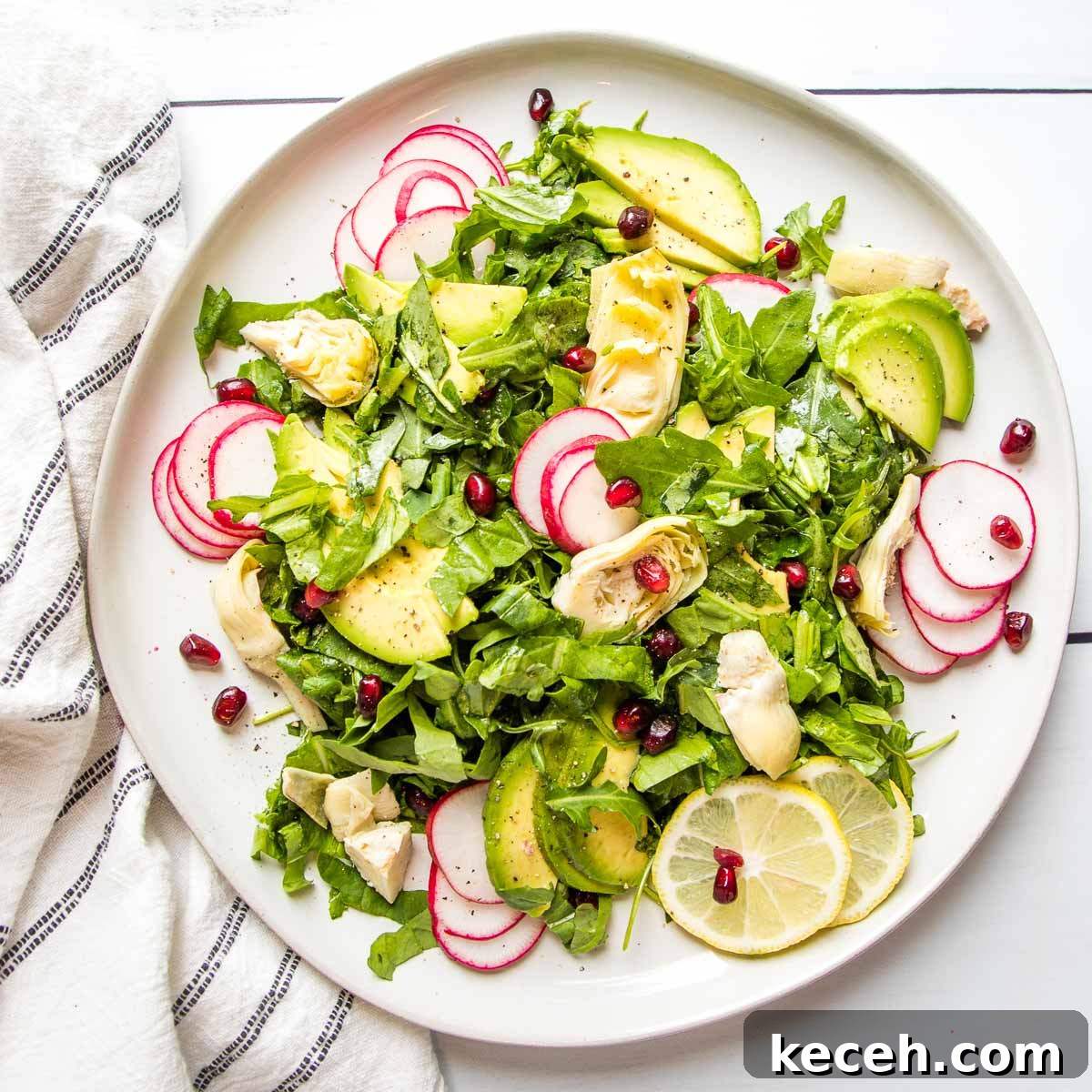 Rosh Hashanah 2026: Festive Recipes and Complete Menu Planner 19 Lemony arugula salad with radish, artichokes, avocado and pomegranate seeds.