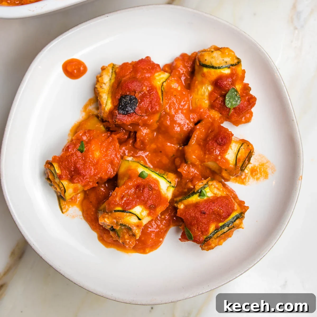 Rosh Hashanah 2026: Festive Recipes and Complete Menu Planner 29 Zucchini lasagna roll ups with marinara.