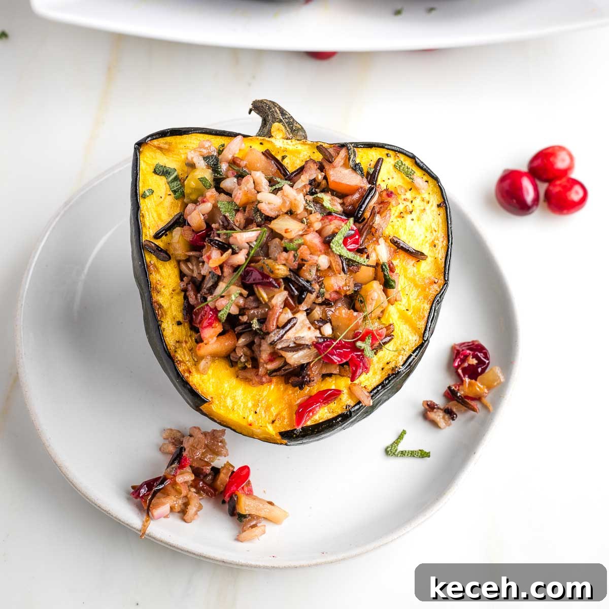 Rosh Hashanah 2026: Festive Recipes and Complete Menu Planner 34 Acorn squash half filled with wild rice and cranberry stuffing.