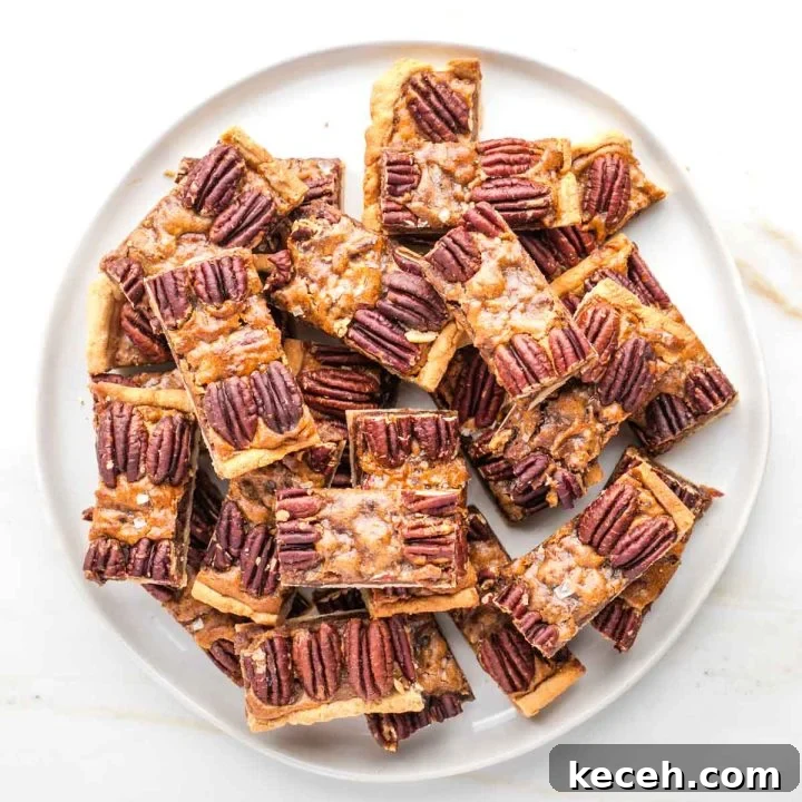 Rosh Hashanah 2026: Festive Recipes and Complete Menu Planner 36 Pecan pie bars on a plate.