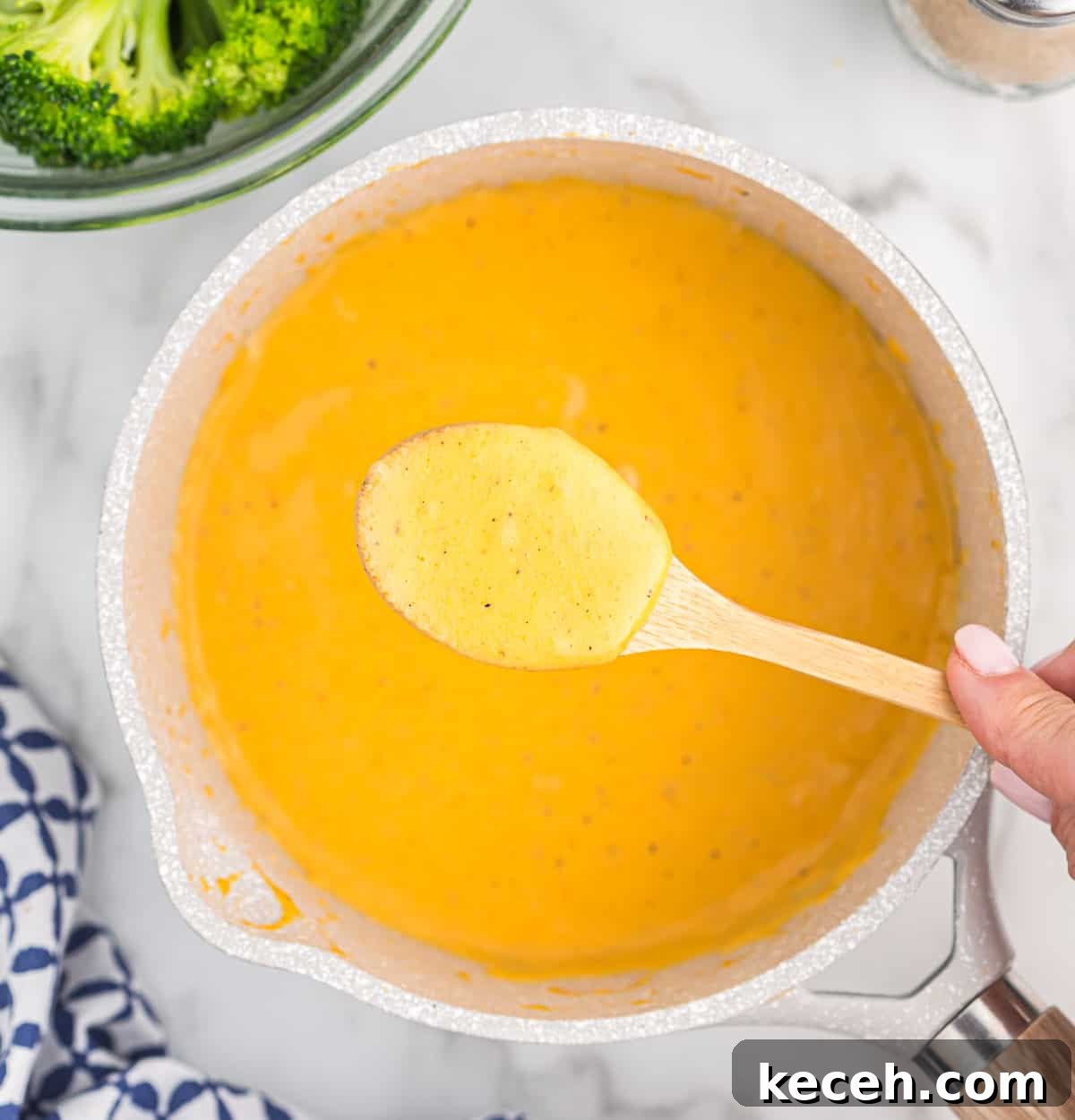 Creamy Cheese Sauce for Broccoli: Quick Recipe & Tips 8 cheddar cheese sauce in a sauce pan