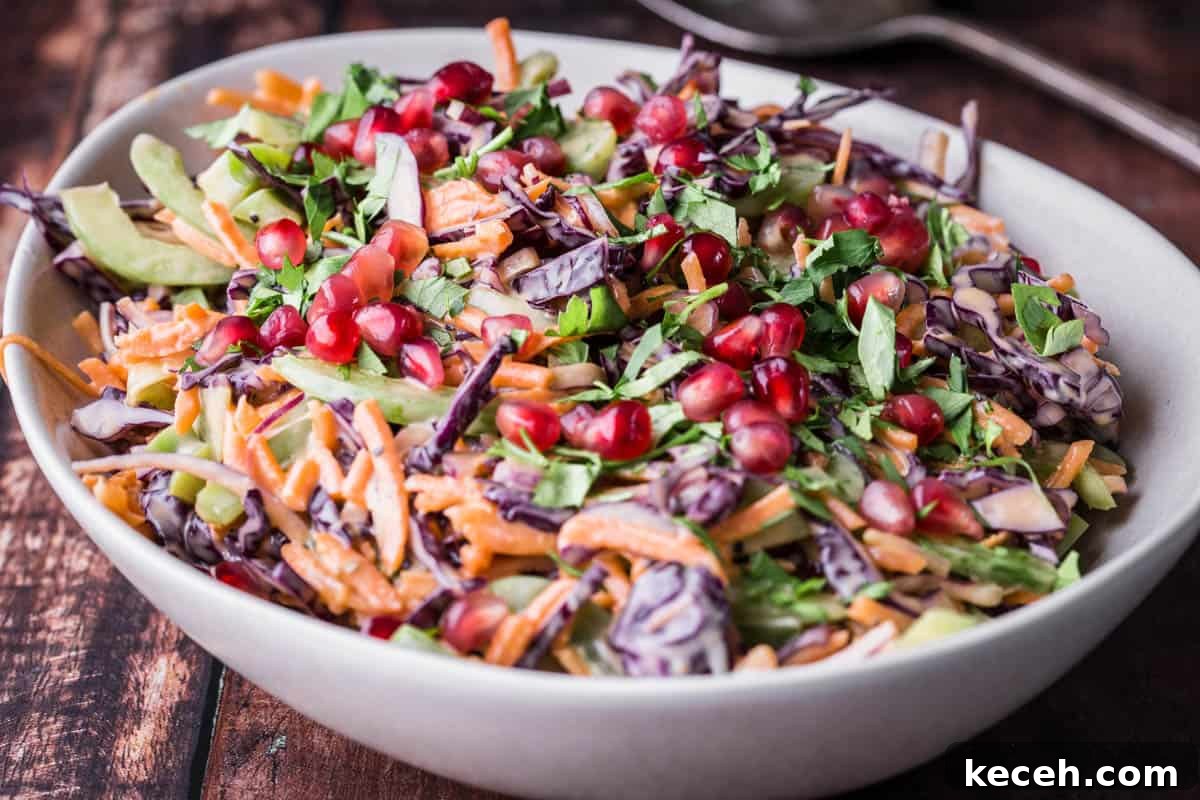 Festive Christmas Coleslaw Recipe for Holiday Gatherings 8 Christmas Coleslaw in a bowl.