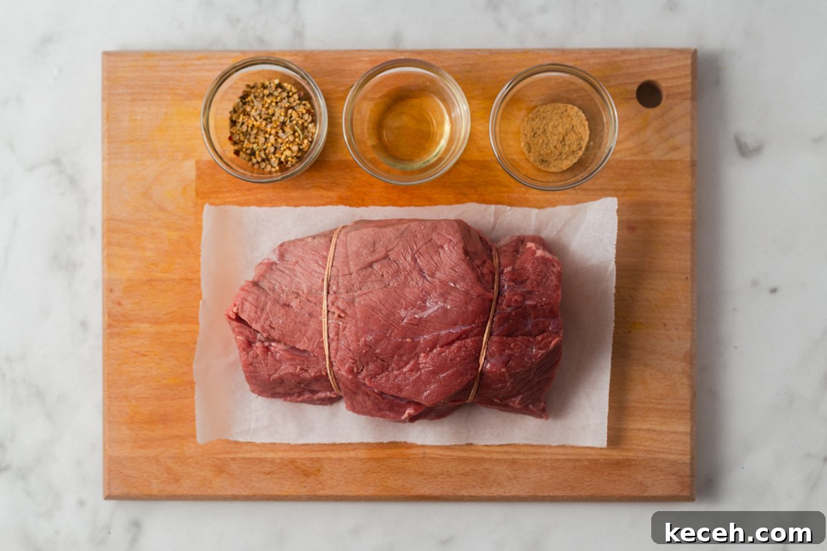 ingredients for air fryer roast beef on a chopping board.