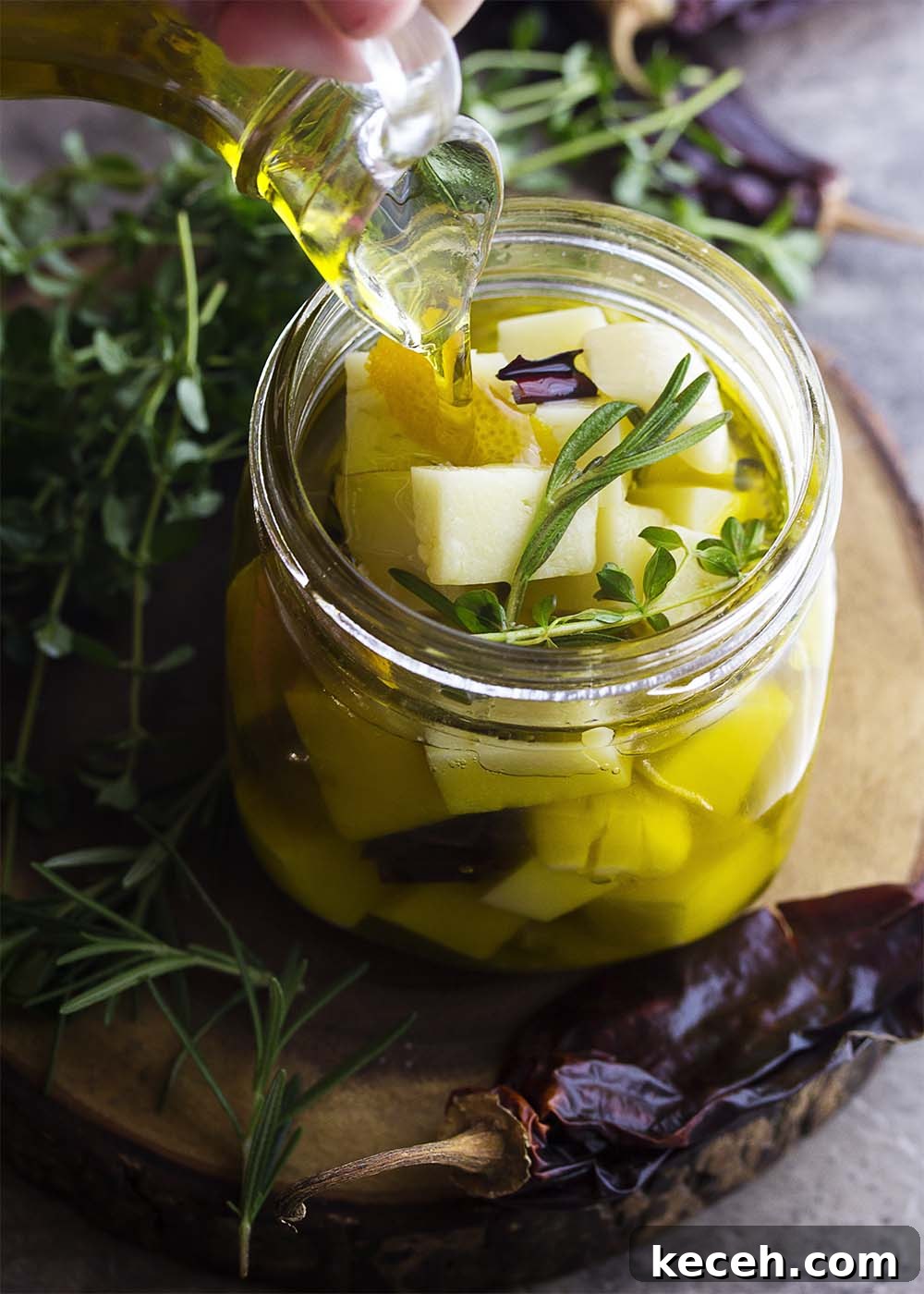 Marinated Manchego Tapas: Savory Spanish Cheese Appetizers 3 Cubes of Spanish manchego cheese marinated with hot peppers, olive oil, and herbs.