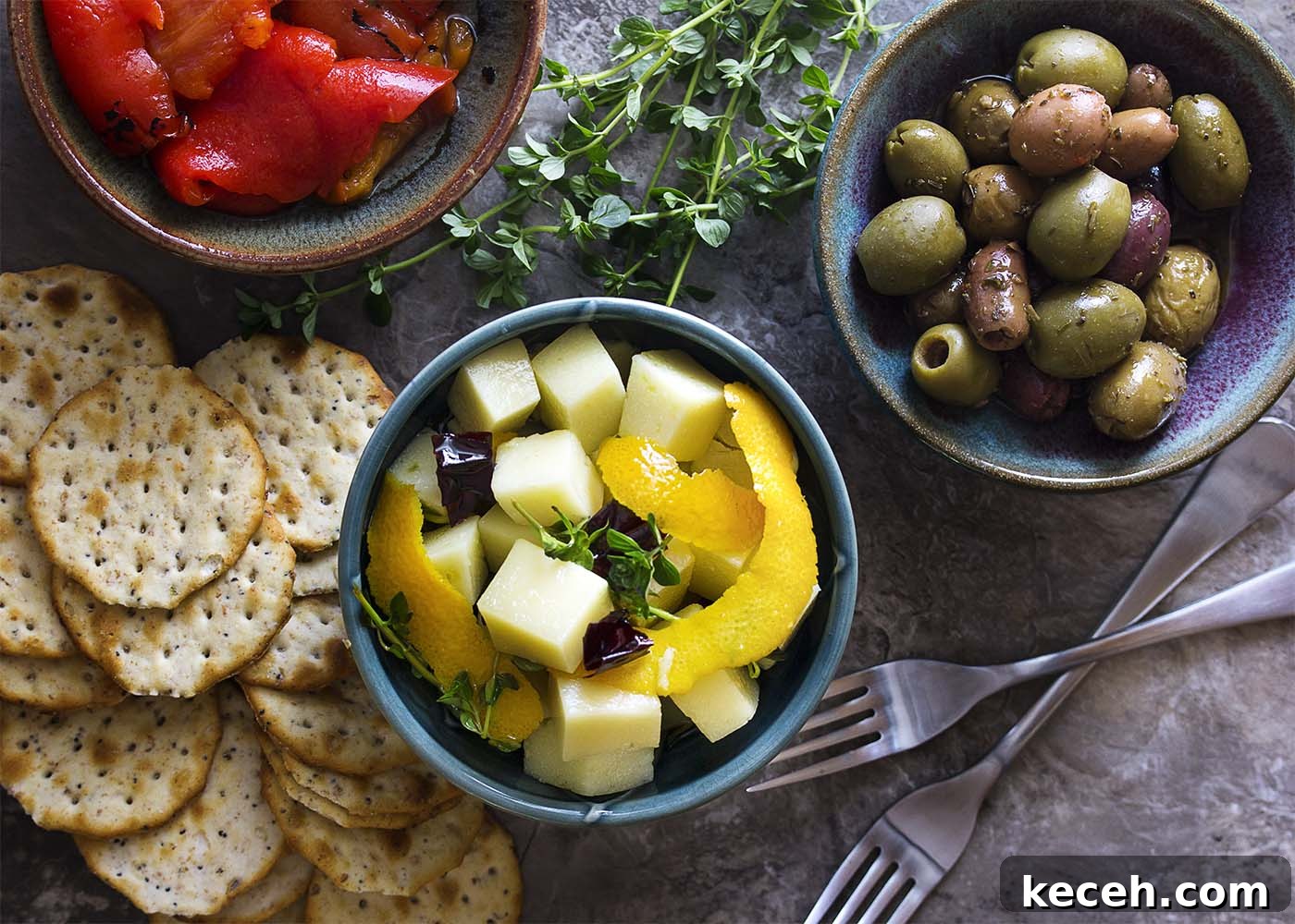 Marinated Manchego Tapas: Savory Spanish Cheese Appetizers 4 Cubes of Spanish manchego cheese marinated with hot peppers, olive oil, and herbs.