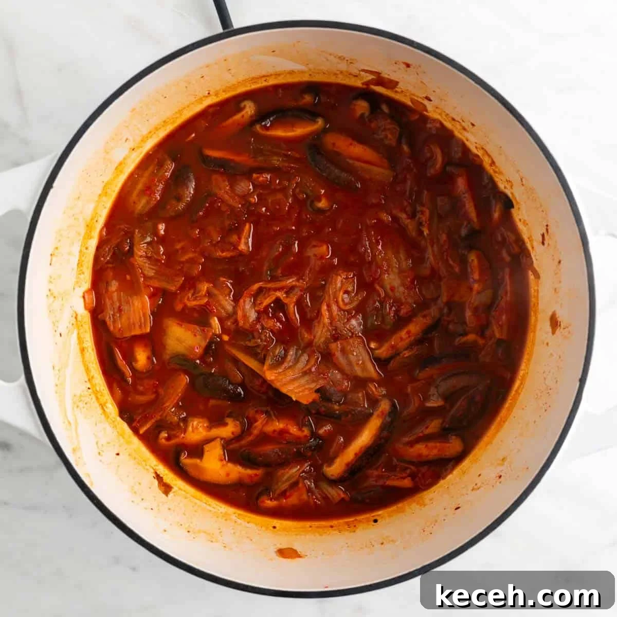 Vegan Kimchi Jjigae Recipe — Spicy Korean Kimchi Stew 6 Vegan kimchi stew in a large pot before adding the tofu.