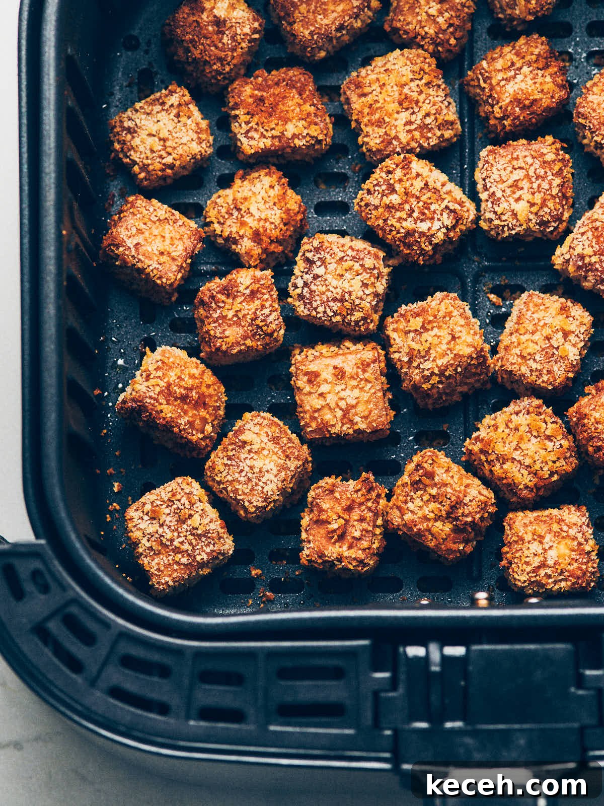 Crispy Air Fryer Breaded Tofu Recipe 17 Baked crispy breaded air fryer tofu in an air fryer basket