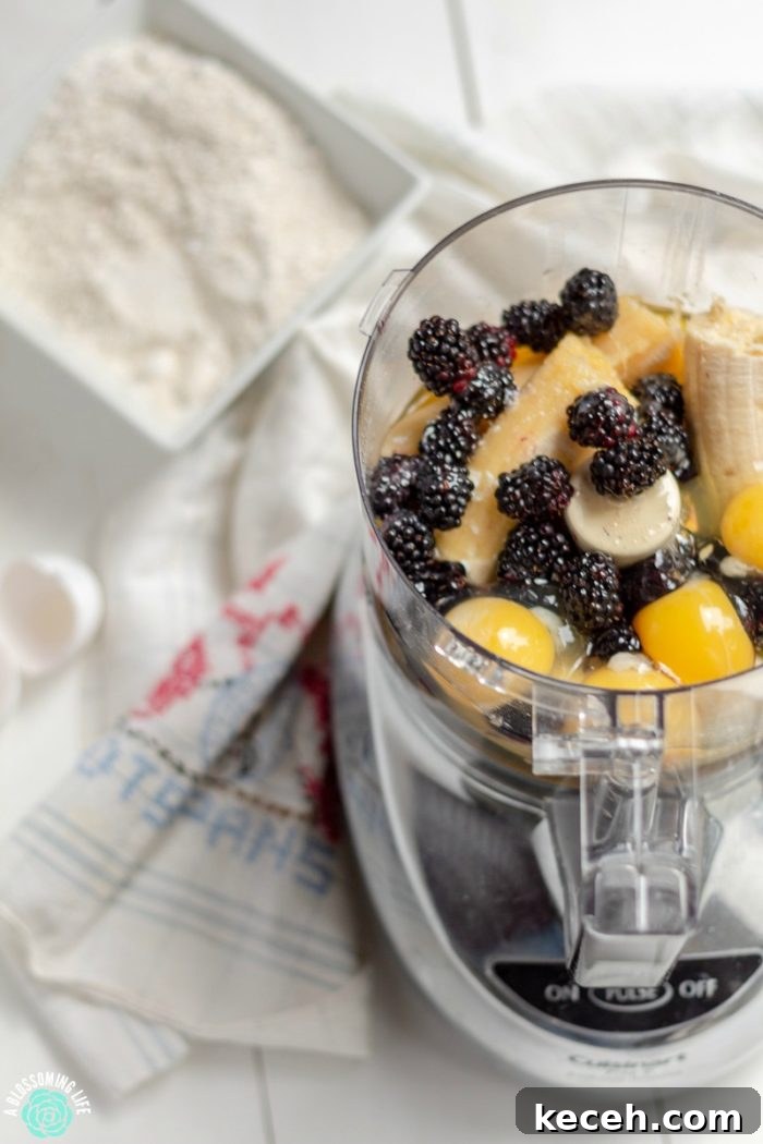 This blackberry banana breakfast bread has a hearty oat texture and a light blackberry flavor that is perfect topped with butter and a drizzle of honey. It is also protein-packed, gluten-free, and has no refined sugar.