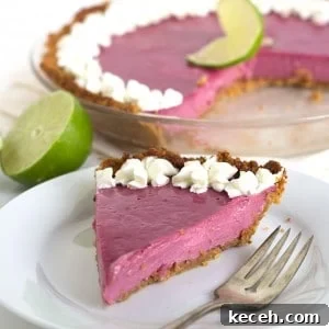 Blackberry Key Lime Pie - Sweet and Tart Twist on a classic Key Lime Pie. It's creamy and gorgeous to look at.