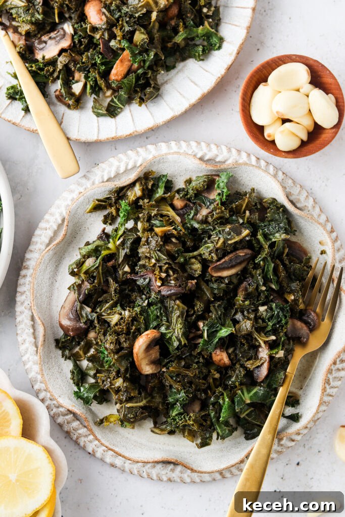 kale and mushrooms on a pretty plate
