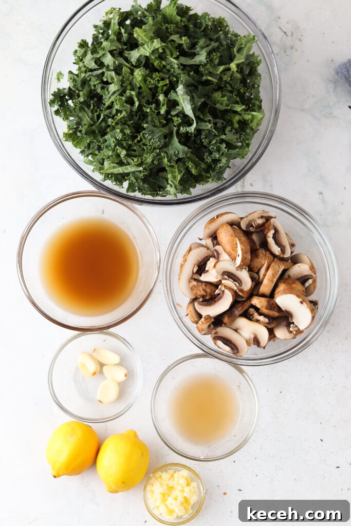 sauteed kale and mushroom ingredients laid out in bowls